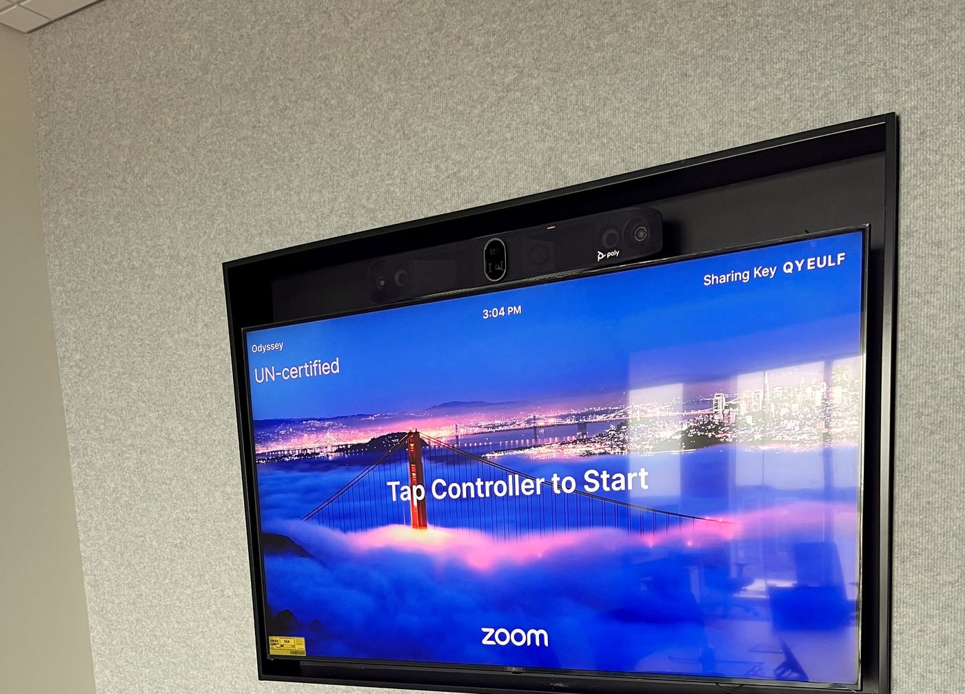 Zoom Room conference display with camera bar in a meeting room