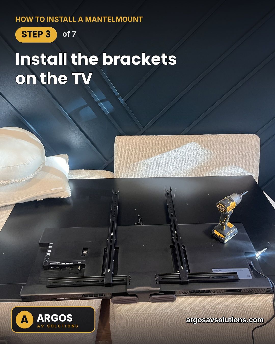 TV face down on a padded surface with MantelMount vertical brackets bolted to the back