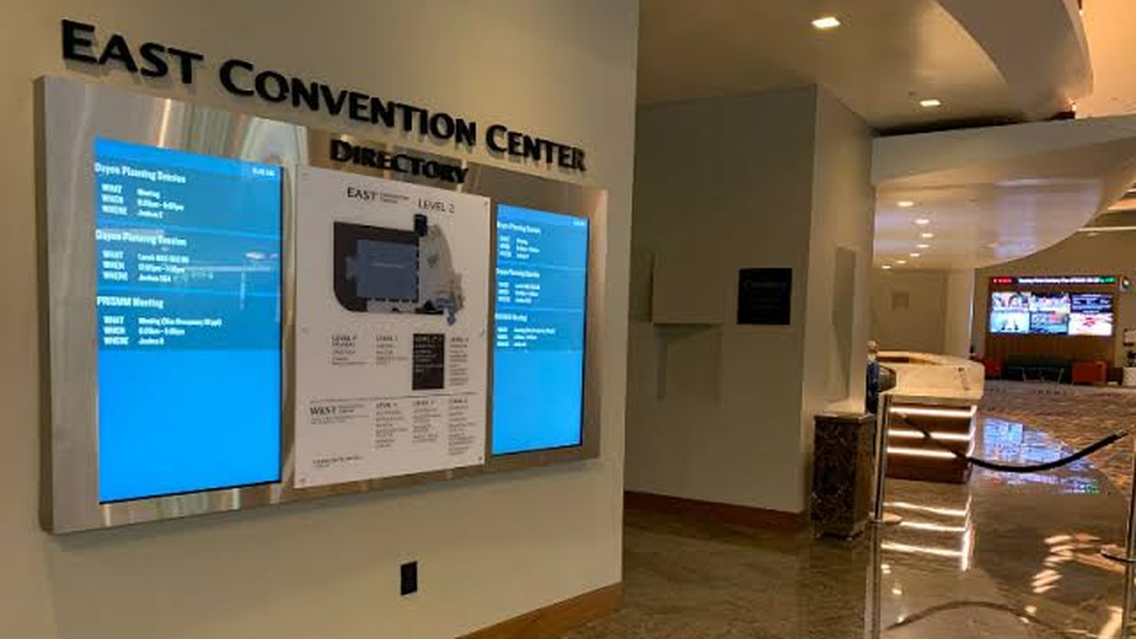 Digital signage directory displays mounted in a convention center lobby — Argos AV commercial displays and digital signage