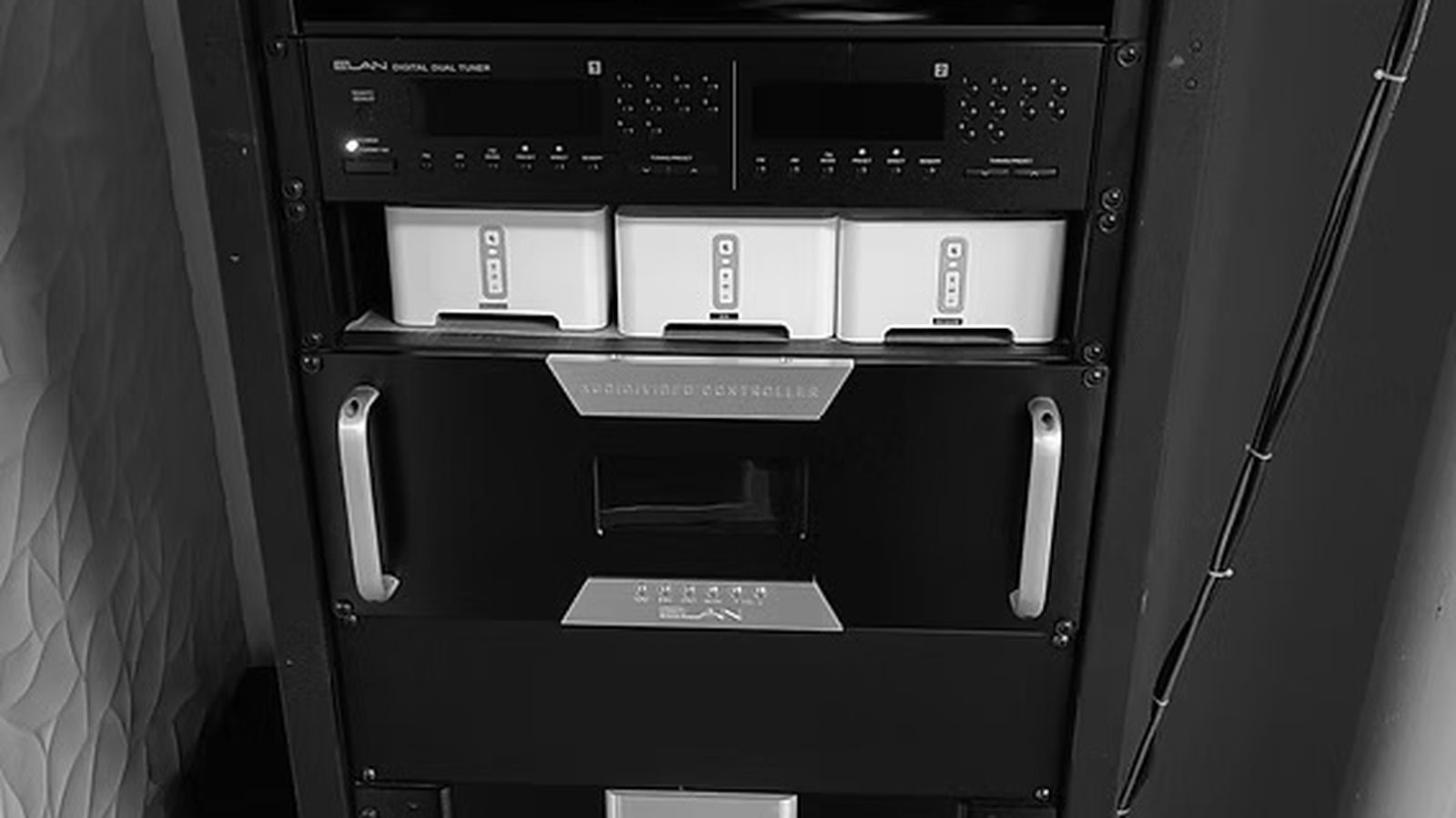 Equipment rack with ELAN controller, Sonos amps and multi-zone tuner for whole-home audio — Argos AV install
